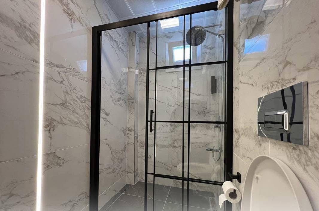 Marble bathroom with rain shower