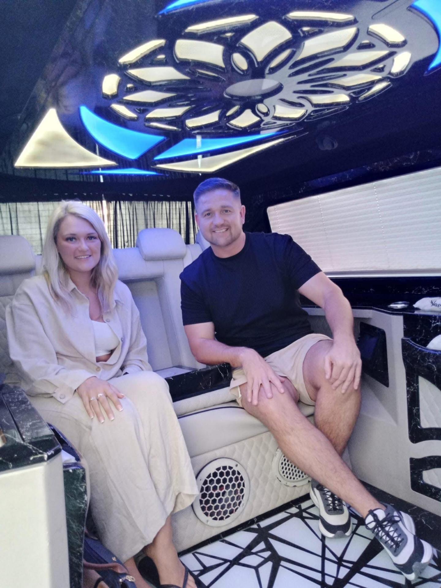 Couple in luxury airport transfer